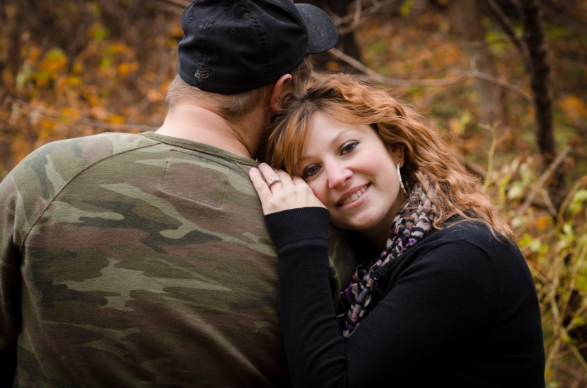engaged couple posing