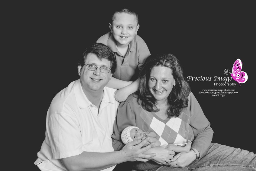 family photo with newborn addition