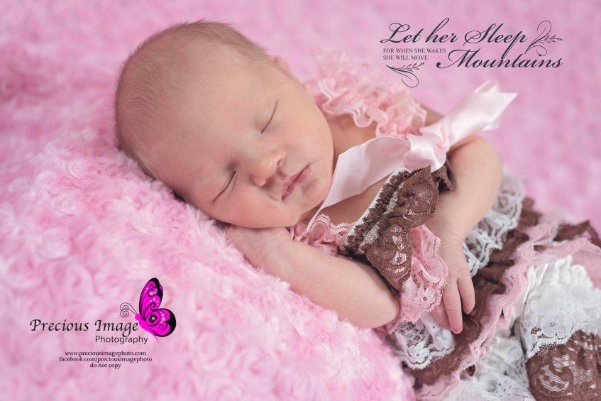 baby girl wearing ruffled romper in holtwood, pa