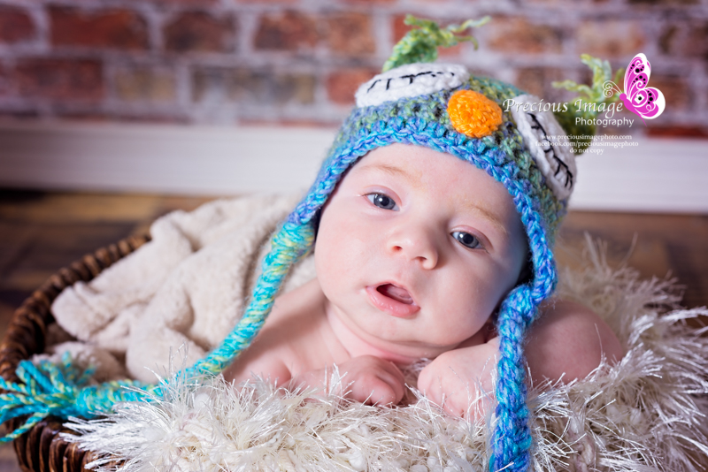 baby wearing crocheted owl hat in quarryville, pa
